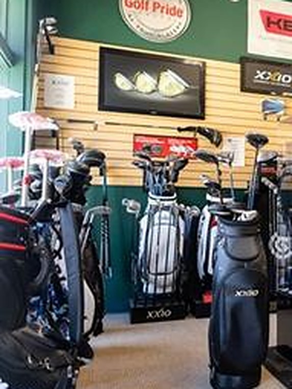 The retail floor at Oakmont Golf Center, with bags and clubs on display